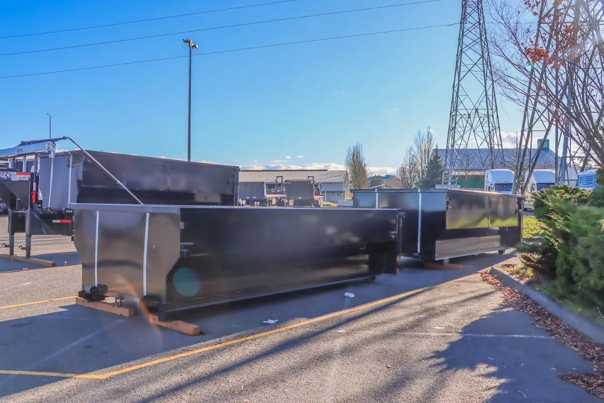 Roll-off dumpster ready for waste disposal at job site for Concrete Dumpster Rental in Bellingham